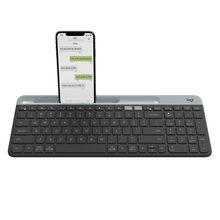Load image into Gallery viewer, Logitech K580 Slim Multi-Device Wireless Keyboard docked phone