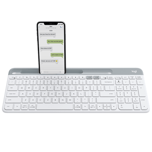 Logitech K580 Slim Multi-Device Wireless Keyboard in white with docked phone